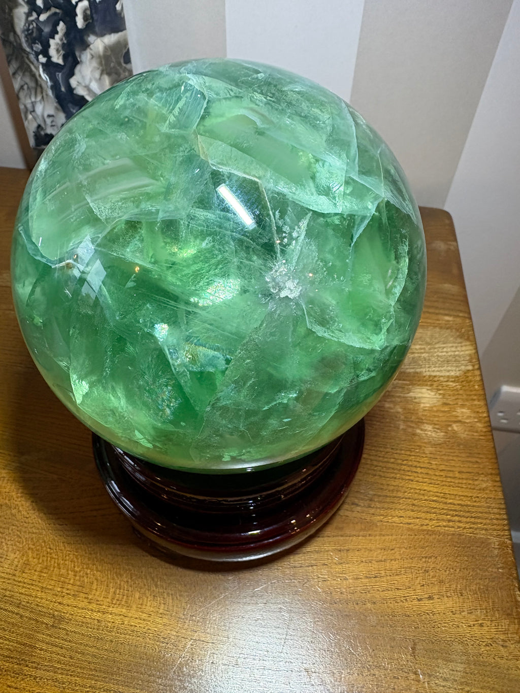 XXL Fluorite Sphere with spinning wooden stand