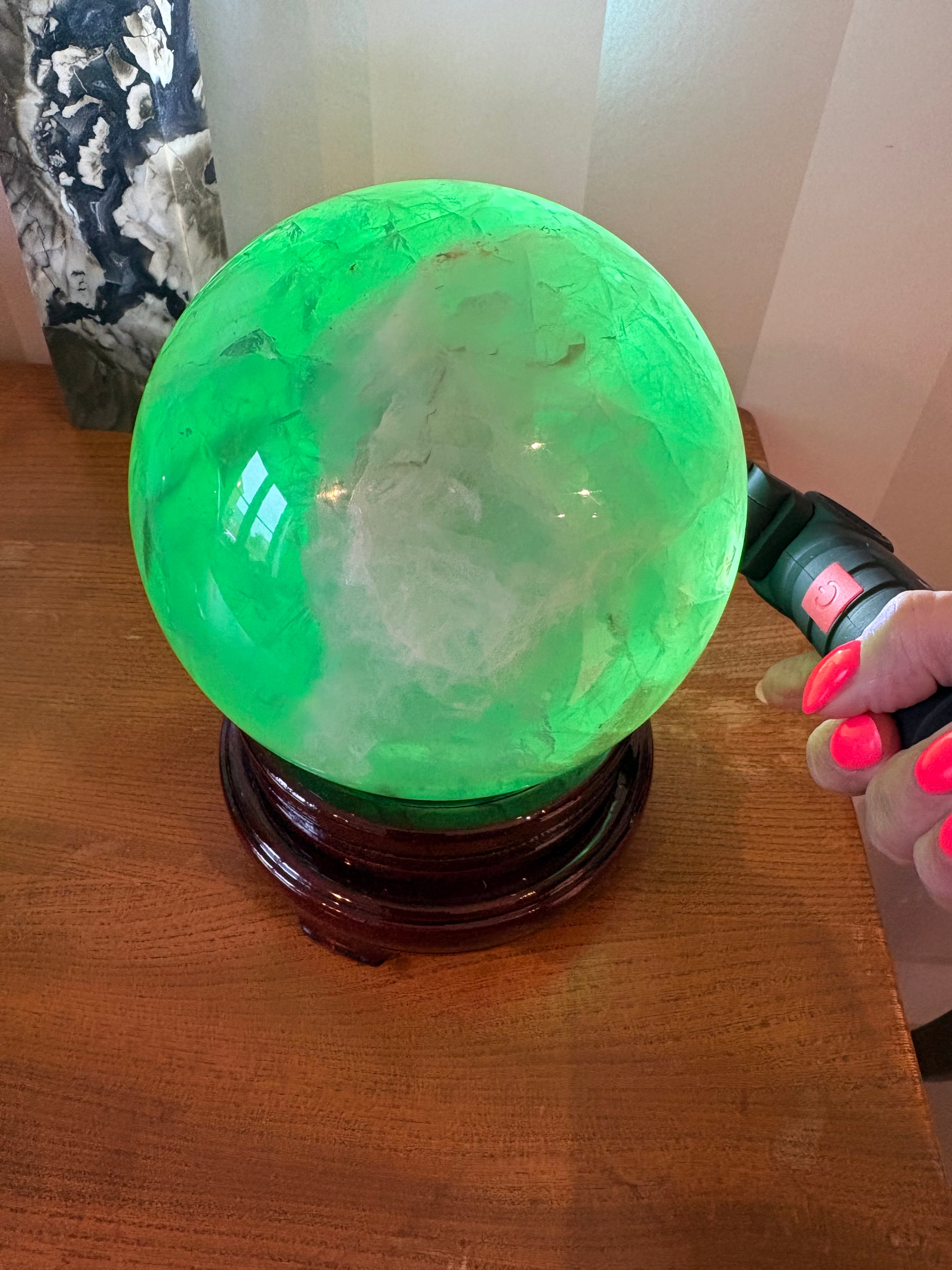 XXL Fluorite Sphere with spinning wooden stand
