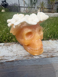 Orange calcite skull