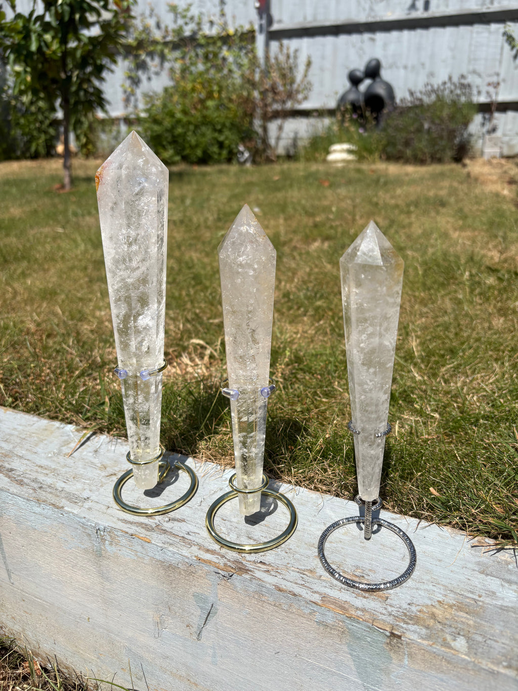 Quartz crystal wands with custom stands